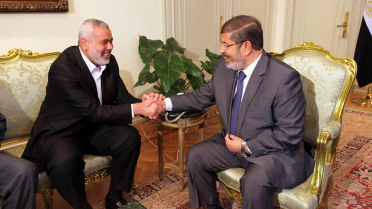Ismail Haniya with Mohammed Morsi: Friendly support
