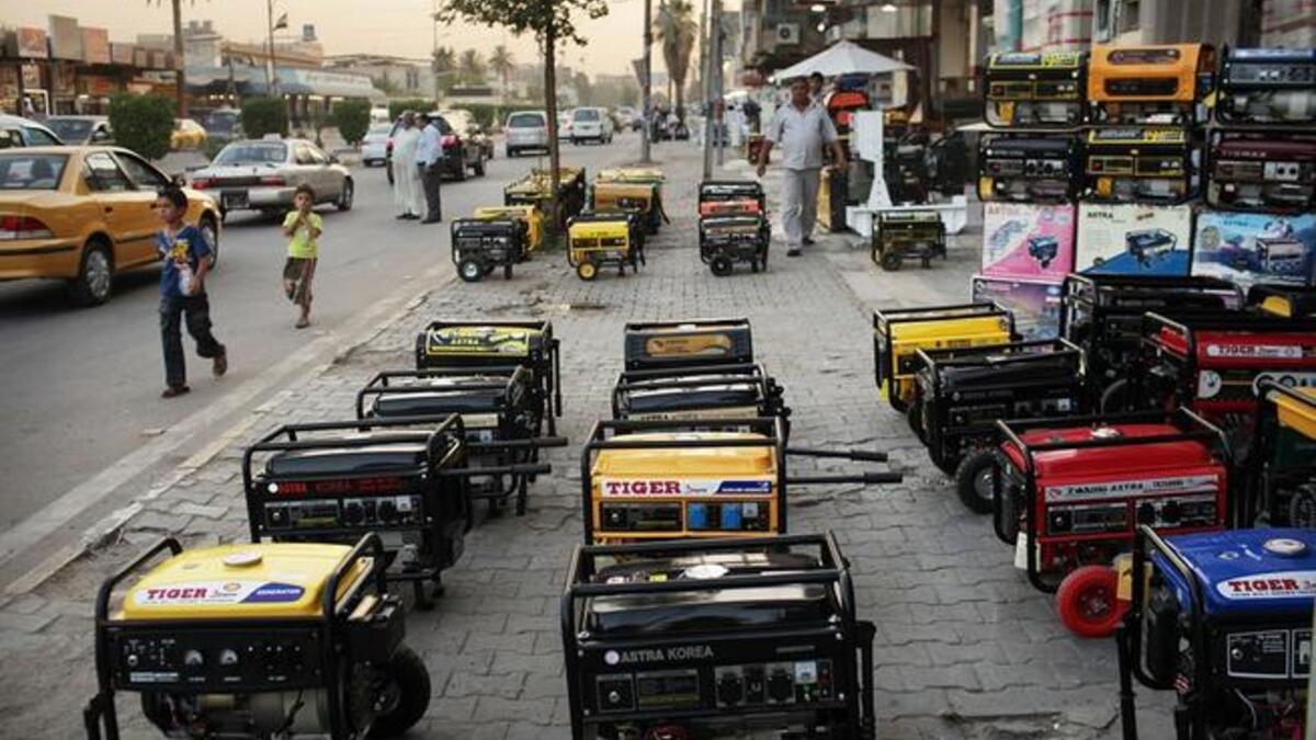 An Iraqi street lined with power generators