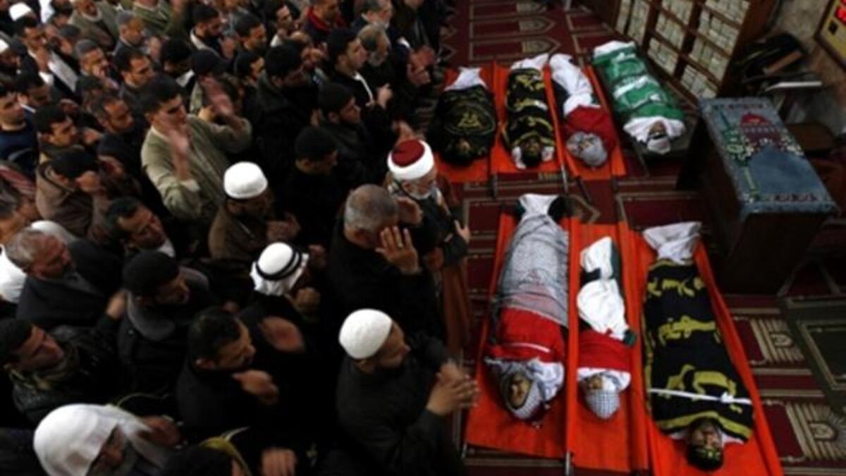 Palestinian mourners attend a funeral at a mosque in Gaza City. A day after eight Gazans were killed, among them two minors and four militants