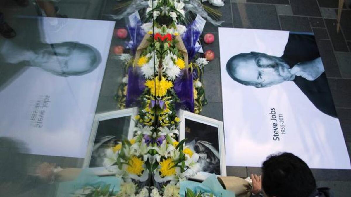 A scene capturing the Chinese emotional and heightened reaction: His mass following saw global aficionados, from China to the UAE - including Dubai that today has become a 'Mecca' to the Apple products.