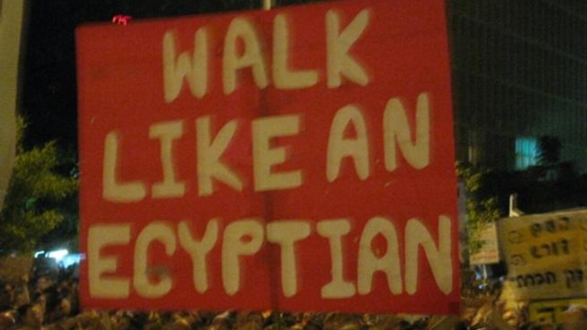 Inspired by the Arab way: What broke out in Sidi Bouzid- an economically-fueled incident involving a stall trader-  
has now caught like the plague. Posters directly allude to the source of confidence drawn from the Arab Spring. 
The battle of the 'haves' & 'have-nots' - in terms of power or of wealth-  lie at the heart of these revolutions.