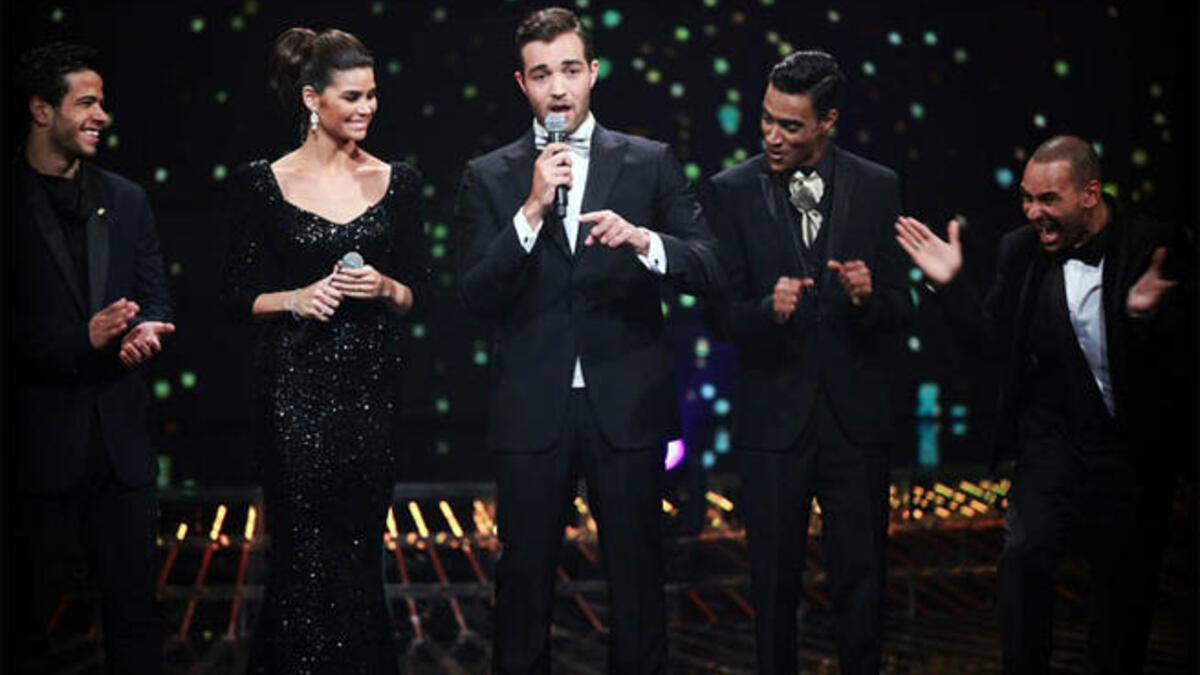 المتسابقين ابراهيم عبد العظيم ومحمد الريفي مع مقدمي البرنامج