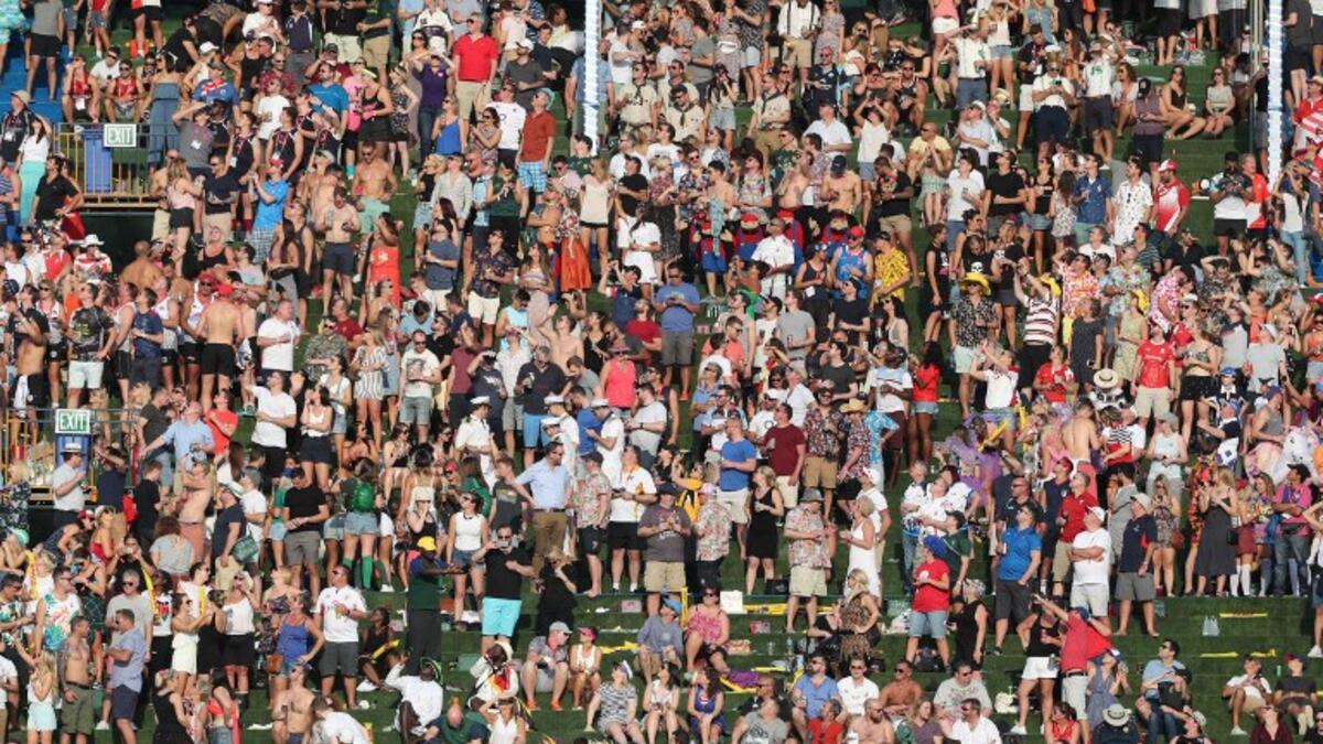 Fans watch a match in the Men's Sevens World Rugby Dubai Series on December 1, 2017 in the Gulf emirate of Dubai.
KARIM SAHIB / AFP