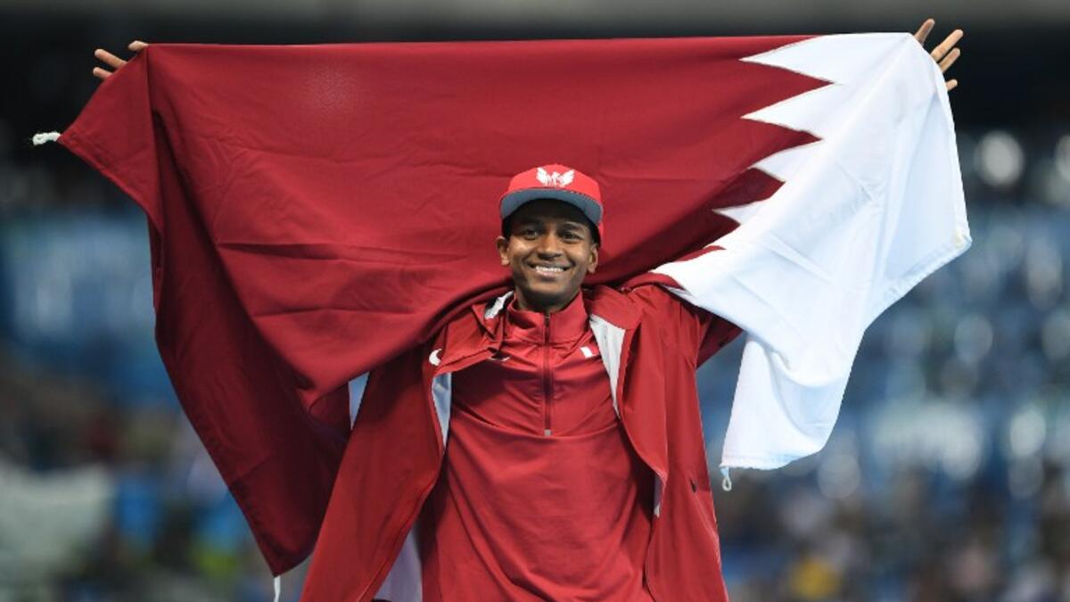 اللاعب القطري معتز برشم: فضية الوثب العالي.