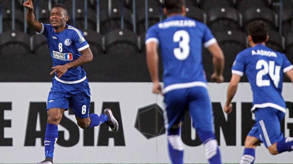 Esteghlal Khuzestan's Aloys Nong celebrates his goal against UAE's al-Jazira during an Asian Champions League Group B football match at Mohammed Bin Zayed Stadium on February 27, 2017.
NEZAR BALOUT / AFP