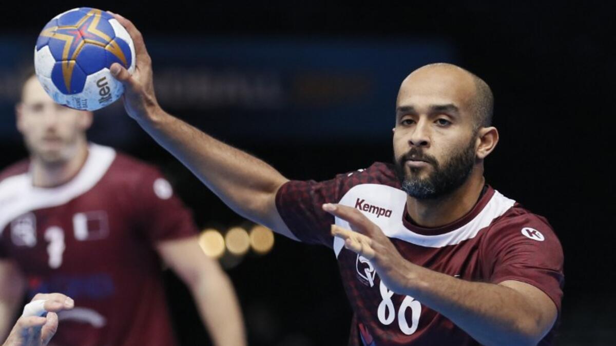 Qatar's centre back Mahmoud Hassaballa passes the ball during the 25th IHF Men's World Championship 2017 Group D handball match Qatar vs Argentina on January 17, 2017 at the AccorHotels Arena in Paris.
Thomas SAMSON / AFP