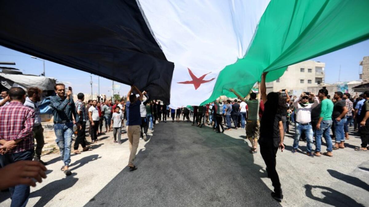 Damascus has every right to take back all its territory, Russian President Vladimir Putin told a summit on September 7 expected to decide the fate of Syria's last major rebel bastion Idlib. (OMAR HAJ KADOUR / AFP)