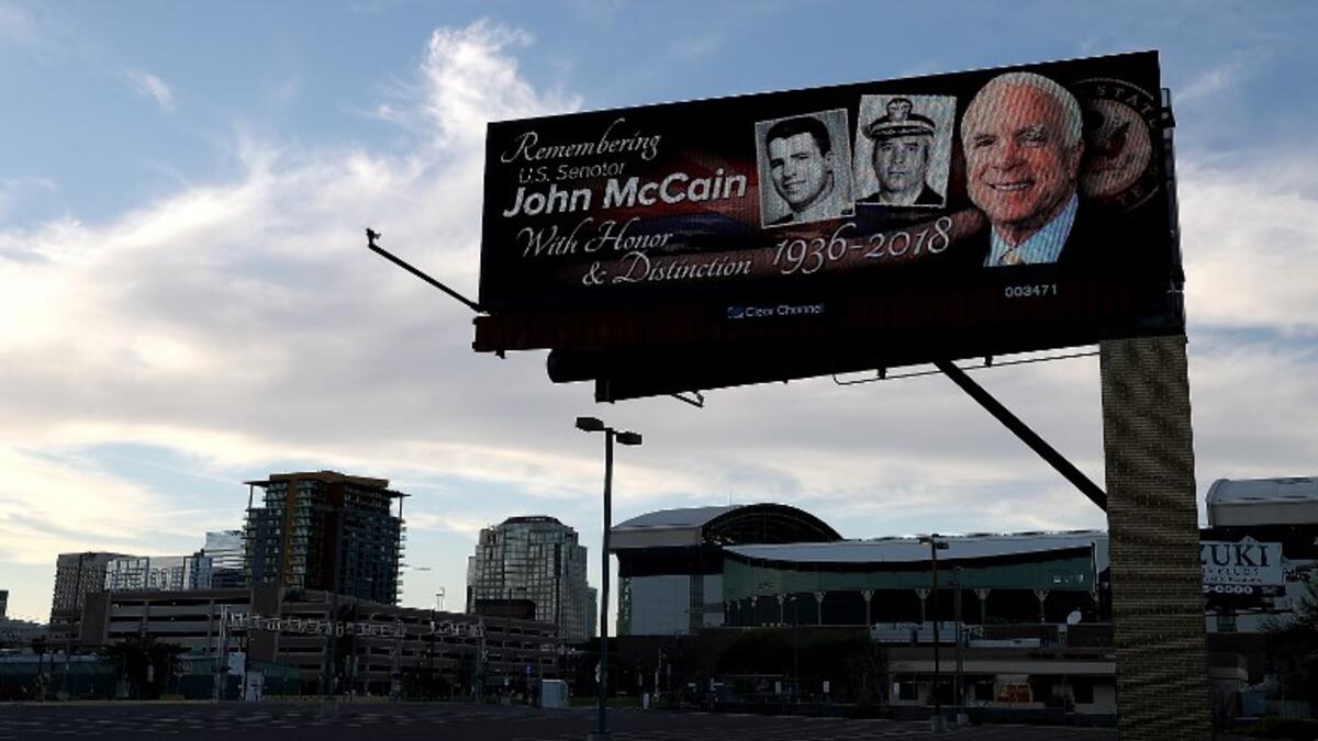 A message honoring U.S. Sen. John McCain (R-AZ) is displayed on a billboard on August 27, 2018 in Phoenix, Arizona. (AFP)