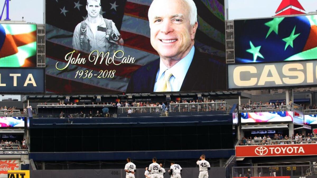 Senator John McCain is remembered during a moment of silence before the start of a baseball game between the Chicago White Sox and the New York Yankees at Yankee Stadium on August 27, 2018 in the Bronx borough of New York City. (AFP)