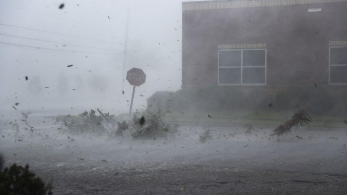Debris is blown down a street by Hurricane Michael on October 10, 2018 in Panama City, Florida. (Joe Raedle/Getty Images/AFP )