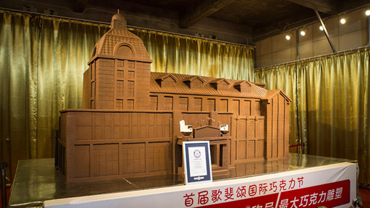 Aficion Chocolate (China) crafted a building 4.08 m long on 30 Sep 2015. Weighing 10,187 kg. This edible edifice outdid the previous record by 1,900 kg. (guinnessworldrecords.com)