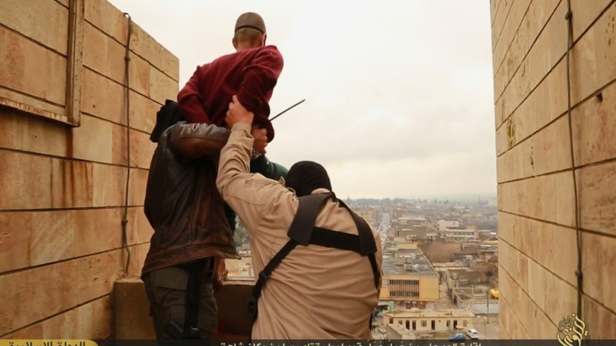 isis throws man from building