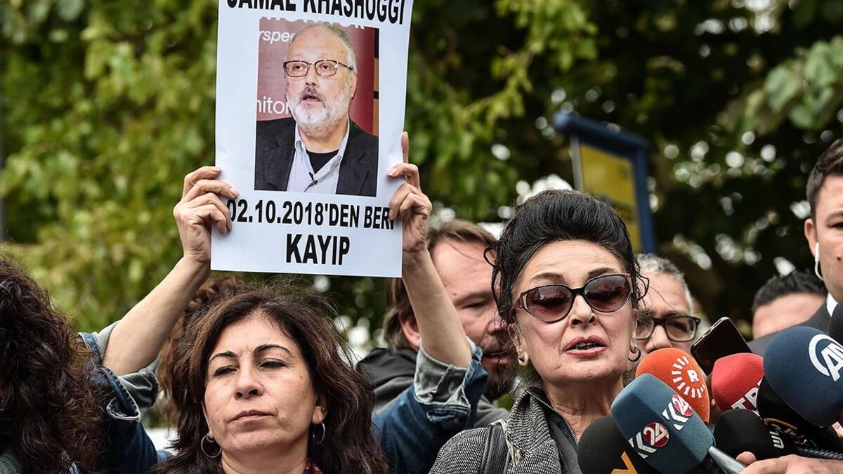Vice president of the Turkish Human Rights Association (IHD) Eren Keskin (R) speaks to journalists during a demonstration in front of the Saudi Arabian consulate on Tuesday in Istanbul. (AFP/File)