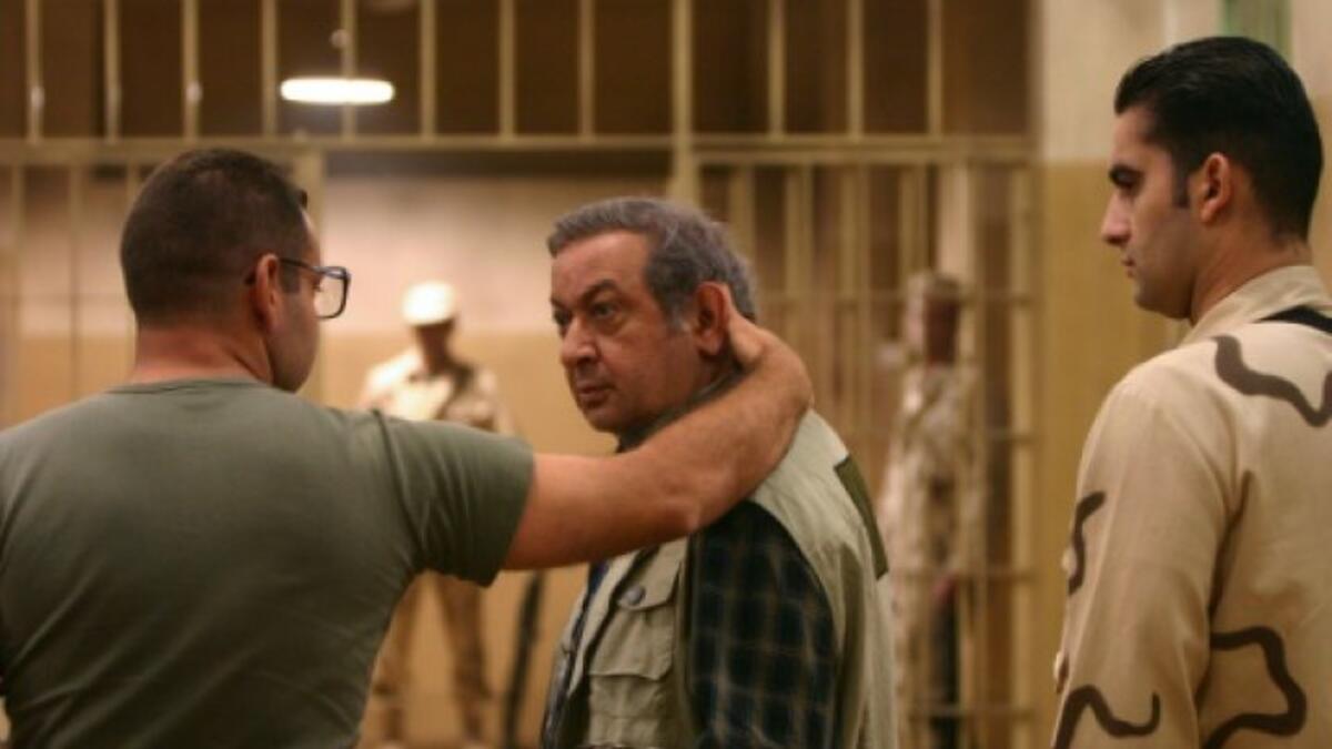 عندما عرض فيلم "ليلة البيبي دول" عام 2008، تعرض لهجوم وانتقاد شديد بسبب المشهد الذي قدمه الشريف عن عمليات التعذيب في سجن أبو غريب بالعراق وظهر فيه عاريا وهو ما برره بـ المهنية وحبه في اظهار الصورة الحقيقية داخل السجن.