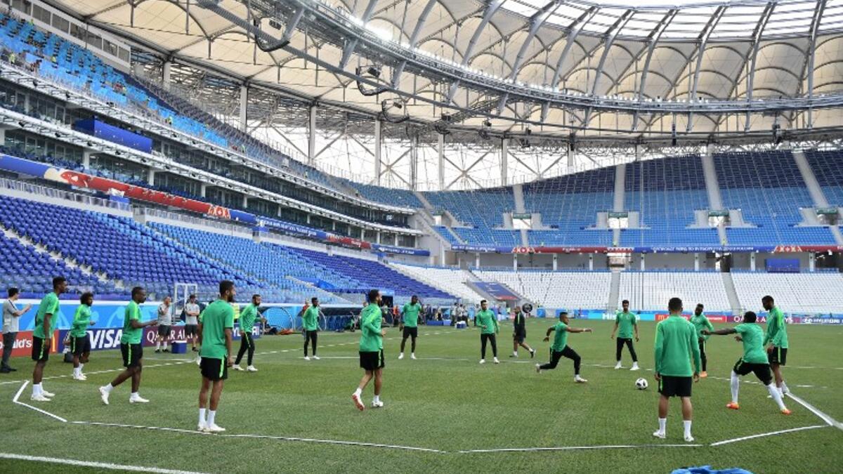 Saudi Arabia's players play with a ball during a training session at the Volgograd Arena in Volgograd on June 24, 2018, on the eve of the Russia 2018 World Cup Group A football match between Saudi Arabia and Egypt.
NICOLAS ASFOURI / AFP