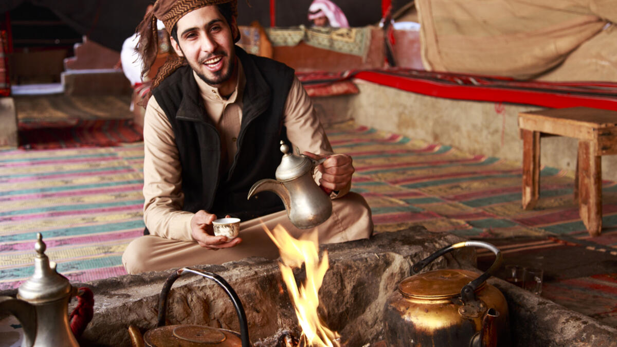 Bedouin man serving Arabic coffee in Wadi Rum,Jordan (Shutterstock/File Photo)