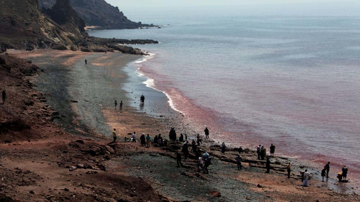 People visit the Hormuz Island in the Gulf Strait of Hormuz, off the Iranian port city of Bandar Abbas, on April 29, 2019.  ATTA KENARE / AFP