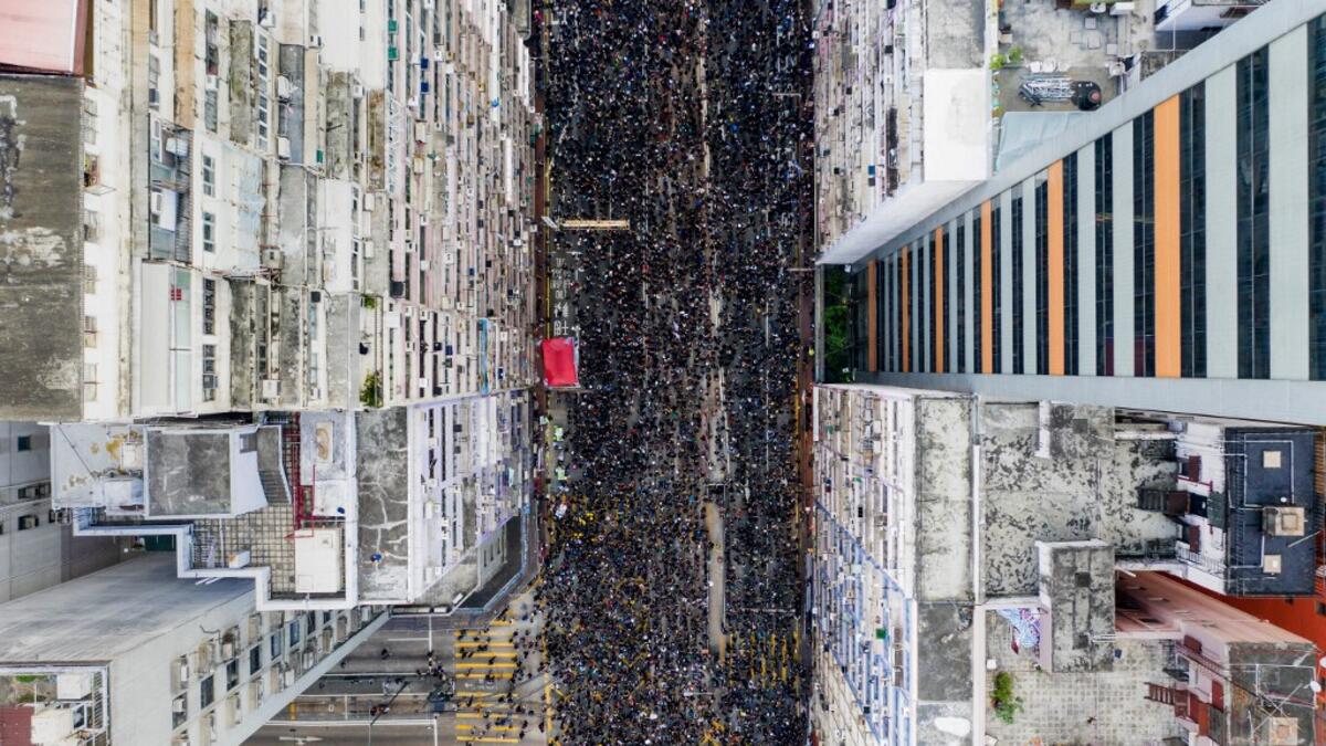 Tens of thousands of people rallied in central Hong Kong on June 16 as public anger seethed following unprecedented clashes between protesters and police over an extradition law, despite a climbdown by the city's embattled leader. STR / AFP