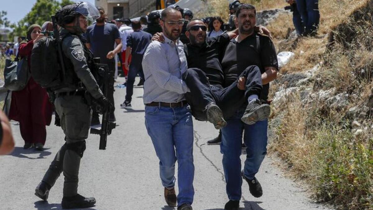 Israeli Forces Kill Veteran Journalist, Demolish Palestinian Homes