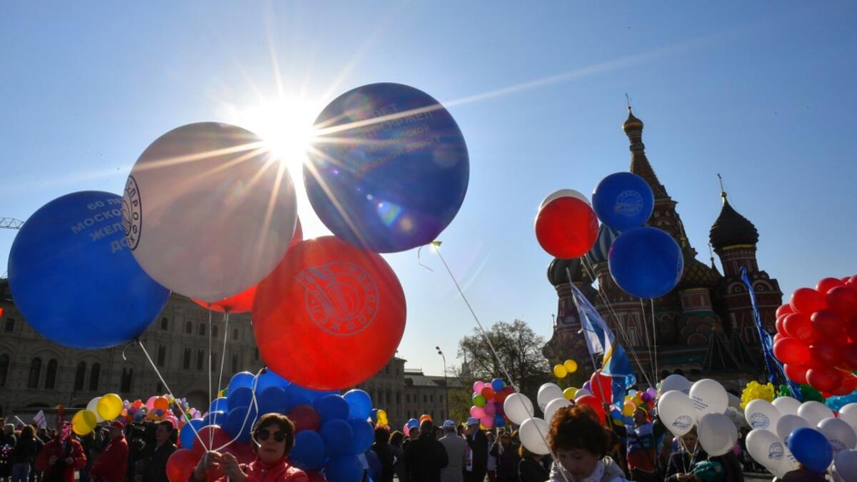 Russian Trade Unions' members holding balloons and flags gather on Red Square for their May Day demonstration in Moscow on May 1, 2019.  Yuri KADOBNOV / AFP