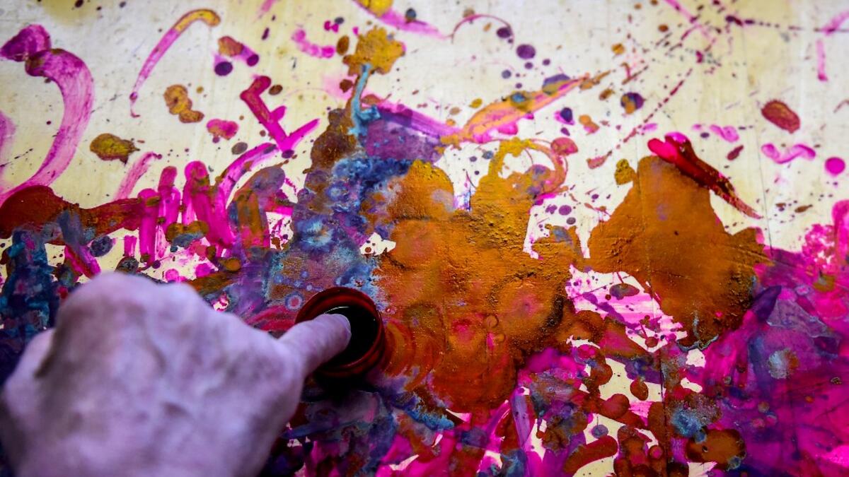 An Egyptian person puts a finger in the ink after voting at a polling station during the third day of a referendum on constitutional amendments, at a school in shamma village in the northern Nile delta province of Menoufia, on April 22, 2019.  Mohamed el-Shahed / AFP
