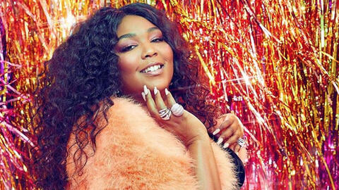 Lizzo Shows Off Curvaceous Figure in Red Thong