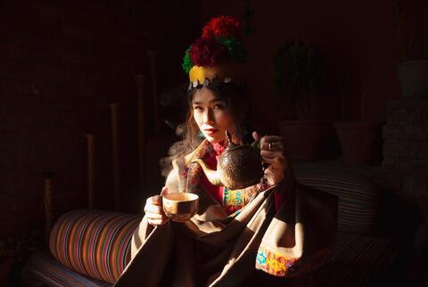 Afghan Photographer Spotlights The Beauty of Women Under The Rubble of War