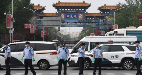 Chinese Officials in Hazmat Suits Beat Woman's Dog to Death