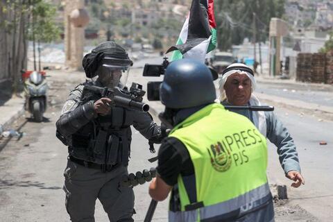 Arrested 28: Palestinian Journalists Face Israeli Guns 