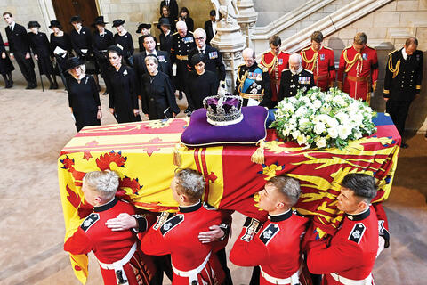 Video: Royal Guard Collapses Near Queen's Coffin
