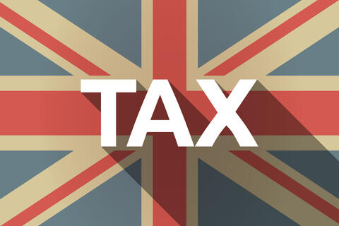 UK Defends Tax-Cutting Budget After Being Urged by IMF to Re-Evaluate Plans