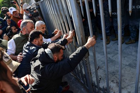 Families of Beirut blast victims break justice palace door