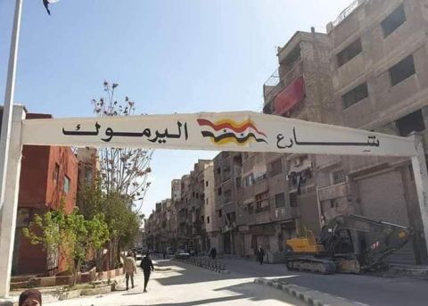 النظام السوري يزيل الرموز الفلسطينية من مخيم اليرموك