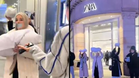 Activists carrying shrouds enter Zara following its campaign