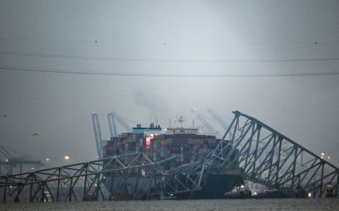 Baltimore bridge collapse: two bodies recovered during search for victims