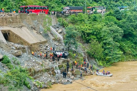 65 missing after buses swept away by swollen river in Nepal