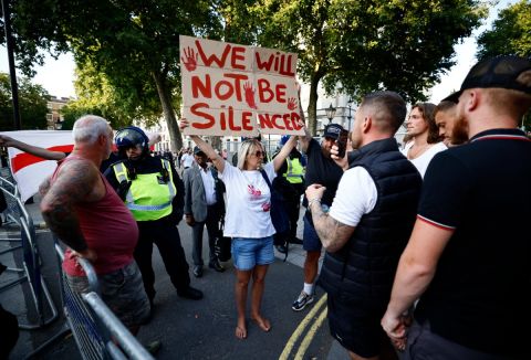 Boy charged with UK Southport stabbings, police arrests 100 protesters