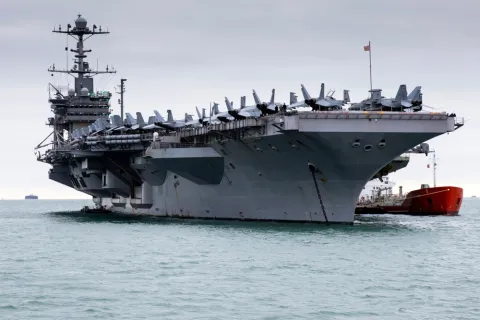 Houthis claim missile and drone attack on US aircraft carrier in Red Sea
