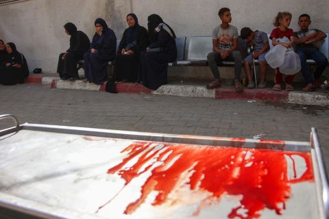Death and destruction in Gaza as Israel targets residential areas and aid teams