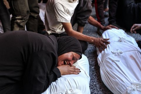 Israeli strikes hit café, charging station in Gaza, killing dozens of civilians