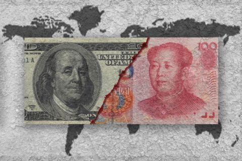 US dollar hits 10-month high as Chinese yuan slides