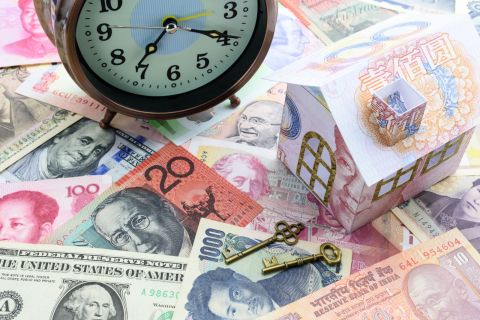 Yuan falls further on surprise rate cuts, slow retail sales