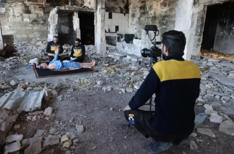 In Pictures: Volunteers and a 'Musaharati' Deliver Pre-Dawn Meals in Syria