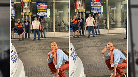Hijabi Woman Drops Spectacular 'Photobomb' on Unsuspecting Anti-Islam Protestors 